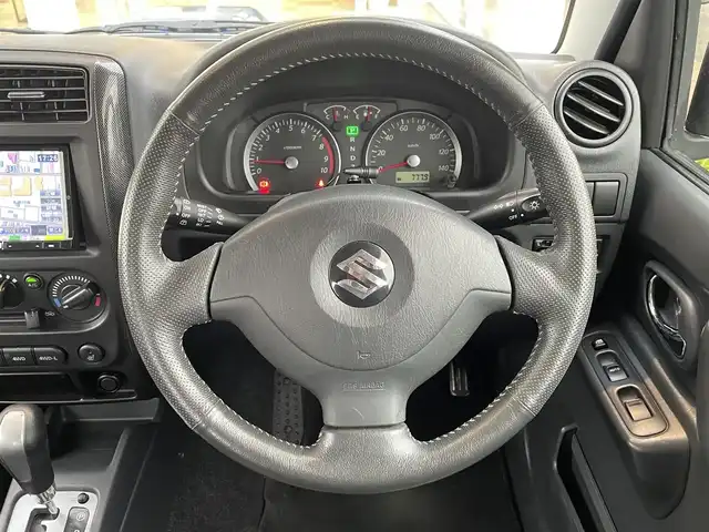 スズキ ジムニー クロスアドベンチャー XC 道央・札幌 2012(平24)年 5万km パールメタリックカシミールブルー ・４WD/・社外ナビ/　CD＆BT＆TV/・シートヒーター/・ミラーヒーター/・電動格納ミラー/・純正フロアマット/・背面タイヤ/・ウィンカーミラー/・フォグライト/・リモコンキー