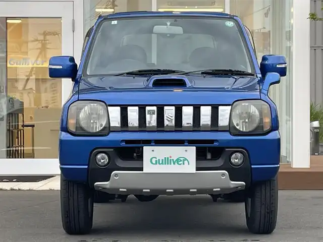 スズキ ジムニー クロスアドベンチャー XC 道央・札幌 2012(平24)年 5万km パールメタリックカシミールブルー ・４WD/・社外ナビ/　CD＆BT＆TV/・シートヒーター/・ミラーヒーター/・電動格納ミラー/・純正フロアマット/・背面タイヤ/・ウィンカーミラー/・フォグライト/・リモコンキー