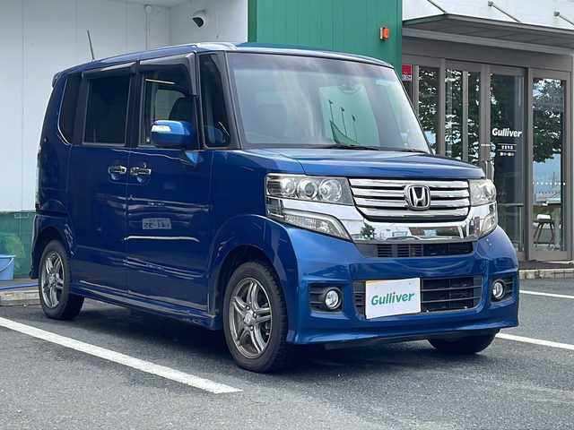 ホンダ Ｎ ＢＯＸ ＋ カスタム G 京都府 2013(平25)年 5万km プレミアムダイナミックブルーパール ・スロープ/・4WD/・純正ナビ/・バックカメラ/・ステアリングリモコン/・革調シートカバー/・ETC/・電動格納式ミラー/・フォグランプ