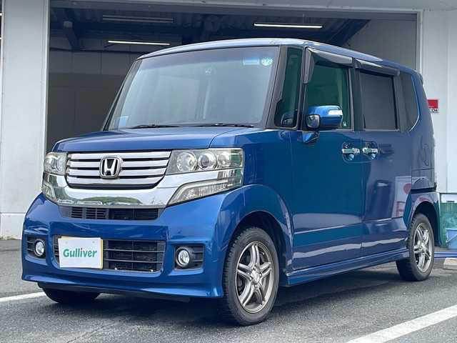 ホンダ Ｎ ＢＯＸ ＋ カスタム G 京都府 2013(平25)年 5万km プレミアムダイナミックブルーパール ・スロープ/・4WD/・純正ナビ/・バックカメラ/・ステアリングリモコン/・革調シートカバー/・ETC/・電動格納式ミラー/・フォグランプ
