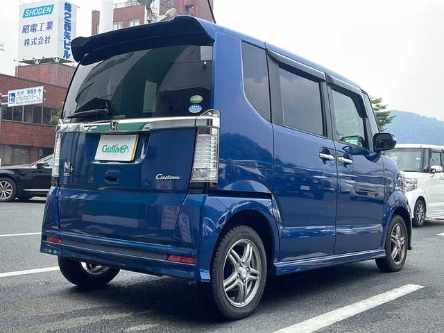 ホンダ Ｎ ＢＯＸ ＋ カスタム G 京都府 2013(平25)年 5万km プレミアムダイナミックブルーパール ・スロープ/・4WD/・純正ナビ/・バックカメラ/・ステアリングリモコン/・革調シートカバー/・ETC/・電動格納式ミラー/・フォグランプ