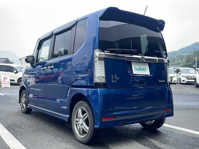 ホンダ Ｎ ＢＯＸ ＋ カスタム G 京都府 2013(平25)年 5万km プレミアムダイナミックブルーパール ・スロープ/・4WD/・純正ナビ/・バックカメラ/・ステアリングリモコン/・革調シートカバー/・ETC/・電動格納式ミラー/・フォグランプ