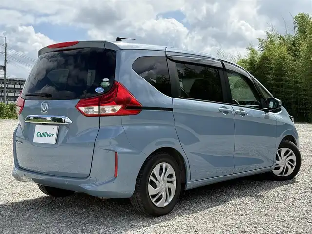 ホンダ フリード G ホンダセンシング 兵庫県 2020(令2)年 1.4万km ライトブルー 純正ナビ/フルセグTV/バックモニター/純正前後ドラレコ/両側パワースライドドア/両前席シートヒーター/ETC/ロールサンシェード/LEDヘッドライト/オートライト/ホンダセンシング/レーダークルーズ＆レーンキープアシスト