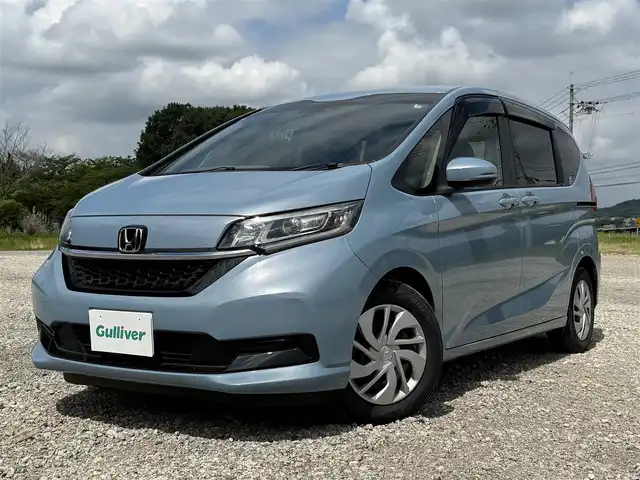 ホンダ フリード G ホンダセンシング 兵庫県 2020(令2)年 1.4万km ライトブルー 純正ナビ/フルセグTV/バックモニター/純正前後ドラレコ/両側パワースライドドア/両前席シートヒーター/ETC/ロールサンシェード/LEDヘッドライト/オートライト/ホンダセンシング/レーダークルーズ＆レーンキープアシスト