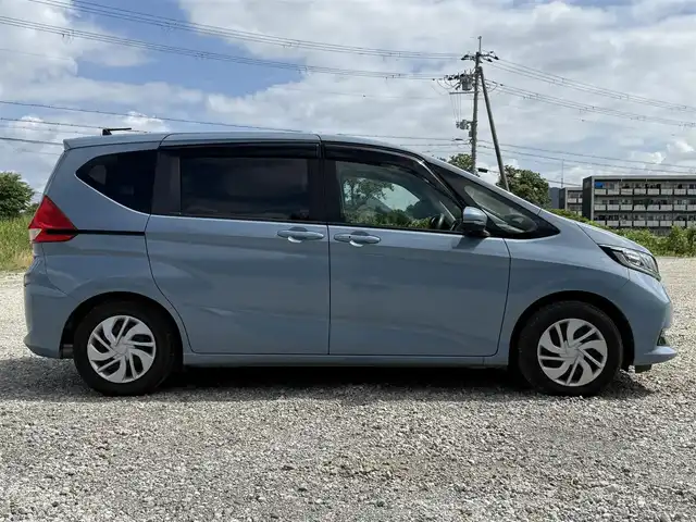 ホンダ フリード G ホンダセンシング 兵庫県 2020(令2)年 1.4万km ライトブルー 純正ナビ/フルセグTV/バックモニター/純正前後ドラレコ/両側パワースライドドア/両前席シートヒーター/ETC/ロールサンシェード/LEDヘッドライト/オートライト/ホンダセンシング/レーダークルーズ＆レーンキープアシスト
