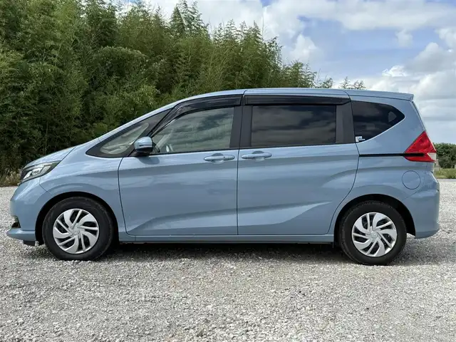 ホンダ フリード G ホンダセンシング 兵庫県 2020(令2)年 1.4万km ライトブルー 純正ナビ/フルセグTV/バックモニター/純正前後ドラレコ/両側パワースライドドア/両前席シートヒーター/ETC/ロールサンシェード/LEDヘッドライト/オートライト/ホンダセンシング/レーダークルーズ＆レーンキープアシスト