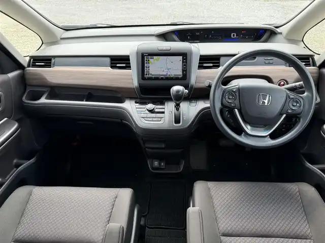 ホンダ フリード G ホンダセンシング 兵庫県 2020(令2)年 1.4万km ライトブルー 純正ナビ/フルセグTV/バックモニター/純正前後ドラレコ/両側パワースライドドア/両前席シートヒーター/ETC/ロールサンシェード/LEDヘッドライト/オートライト/ホンダセンシング/レーダークルーズ＆レーンキープアシスト