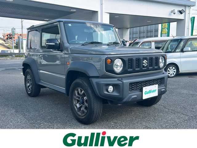 スズキ ジムニー シエラ JC 愛知県 2021(令3)年 2.8万km ミディアムグレー ワンオーナー/社外ナビ/フルセグ/前席シートヒーター/クルコン/ETC/オートライト/保証書/取説/記録簿/スペアキー