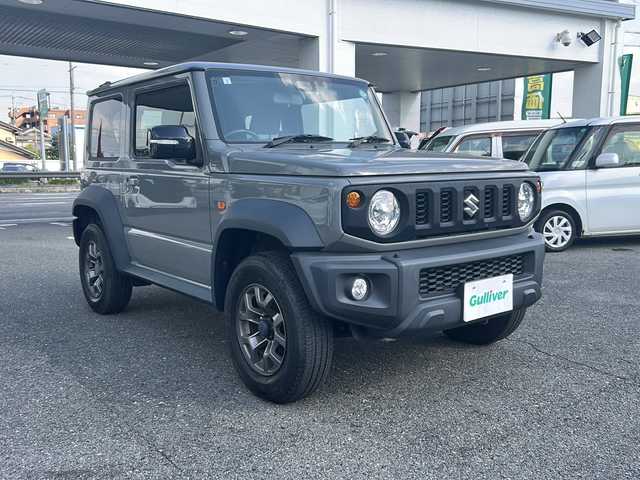 スズキ ジムニー シエラ JC 愛知県 2021(令3)年 2.8万km ミディアムグレー ワンオーナー/社外ナビ/フルセグ/前席シートヒーター/クルコン/ETC/オートライト/保証書/取説/記録簿/スペアキー