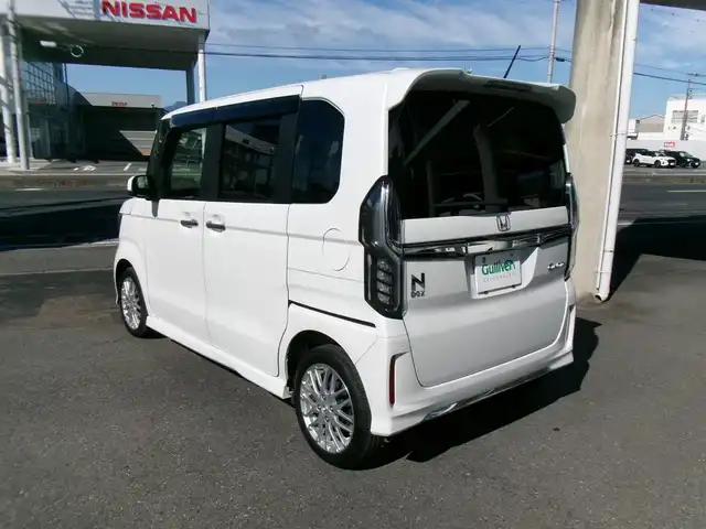 ホンダ Ｎ ＢＯＸ カスタム L ターボ 群馬県 2021(令3)年 4.4万km プラチナホワイトパール 4WDターボ/ホンダセンシング/社外メモリーナビ・フルセグTV/　・BT・DVD(CN-RE07D)/バックモニター/360°ドラレコ(DRV-CW560)/社外ETC/ハーフレザーシート/前席シートヒーター/両側パワースライドドア/シートバックテーブル/スマートキー×2＆プッシュスタート/保証書＆取説