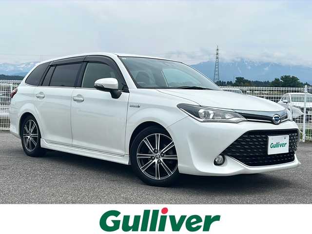トヨタ カローラ フィールダー ハイブリッドG ダブルバイビー 富山県 2015(平27)年 14.5万km ホワイトパールクリスタルシャイン 社外SDナビ（CN-RS02WD）/フルセグ/Bluetooth/バックカメラ/ETC/衝突被害軽減ブレーキ/レーンアシスト/オートマッチクハイビーム