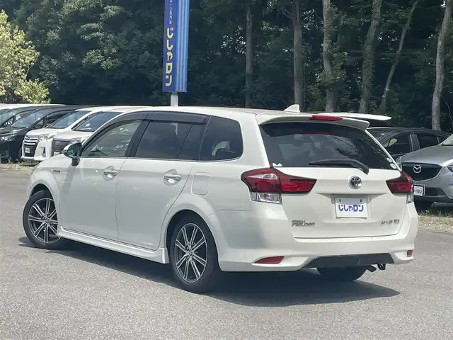 トヨタ カローラ フィールダー ハイブリッドG ダブルバイビー 栃木県 2015(平27)年 14.5万km ホワイトパールクリスタルシャイン (株)IDOMが運営する【じしゃロン宇都宮店】の自社ローン専用車両になります。こちらは現金またはオートローンご利用時の価格です。自社ローンご希望の方は別途その旨お申付け下さい/社外SDナビ（CN-RS02WD）/フルセグ/Bluetooth/バックカメラ/ETC/衝突被害軽減ブレーキ/レーンアシスト/オートマッチクハイビーム