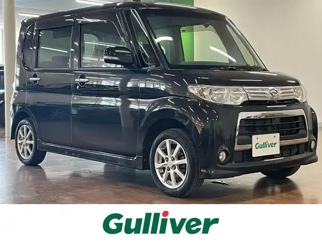 ダイハツ タント カスタム X 道央・札幌 2013(平25)年 11.1万km ブラックマイカメタリック 4WD/社外SDナビ/・ワンセグTV/CD/DVD/BT/SD/AM/FM/純正エンジンスターター/社外360°ドライブレコーダー/左側パワースライドドア /アイドリングストップ/純正フロアマット/純正ドアバイザー/ウインカーミラー/HIDヘッドライト/フォグライト/ベンチシート/サイドエアロ/純正14インチAW/新車時保証書/取扱説明書