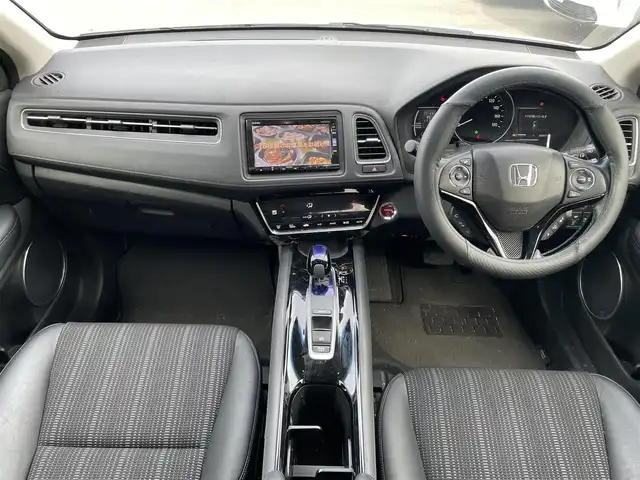 ホンダ ヴェゼル ハイブリッド 静岡県 2017(平29)年 5.5万km ホワイトオーキッドパール 純正ナビ　/・フルセグＴＶ　/・Ｂｌｕｅｔｏｏｔｈ接続　/・ＤＶＤ再生　/・ＵＳＢ入力端子　/ホンダセンシング/バックカメラ　/プッシュスタート　/スマートキー　/スペアキー　/ルーフレール/電動パーキングブレーキ/オートブレーキホールド　/前席シートヒーター　/ハーフレザーシート/ＬＥＤオートライト/ビルトインETC