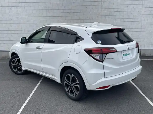 ホンダ ヴェゼル ハイブリッド 静岡県 2017(平29)年 5.5万km ホワイトオーキッドパール 純正ナビ　/・フルセグＴＶ　/・Ｂｌｕｅｔｏｏｔｈ接続　/・ＤＶＤ再生　/・ＵＳＢ入力端子　/ホンダセンシング/バックカメラ　/プッシュスタート　/スマートキー　/スペアキー　/ルーフレール/電動パーキングブレーキ/オートブレーキホールド　/前席シートヒーター　/ハーフレザーシート/ＬＥＤオートライト/ビルトインETC