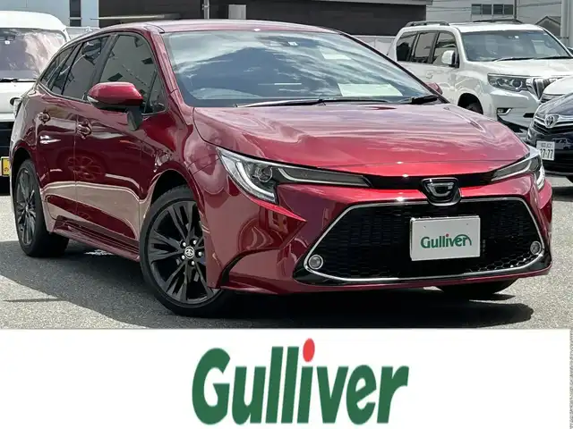 トヨタ カローラツーリング ダブルバイビー 福岡県 2022(令4)年 1.4万km センシュアルレッドマイカ ワンオーナー/禁煙車/純正ナビ（AM/FM/BT）/レーダークルーズコントロール/前席シートヒーター/ステアリングヒーター/バックカメラ/クリアランスソナー/ビルトインETC/LEDライト/オートハイビーム/フォグライト/ウインカーミラー/プッシュスタート/スマートキー/スペア×１/横滑り防止装置/レーンキープアシスト/純正フロアマット/純正１７インチアルミホイール/保証書/取扱説明書