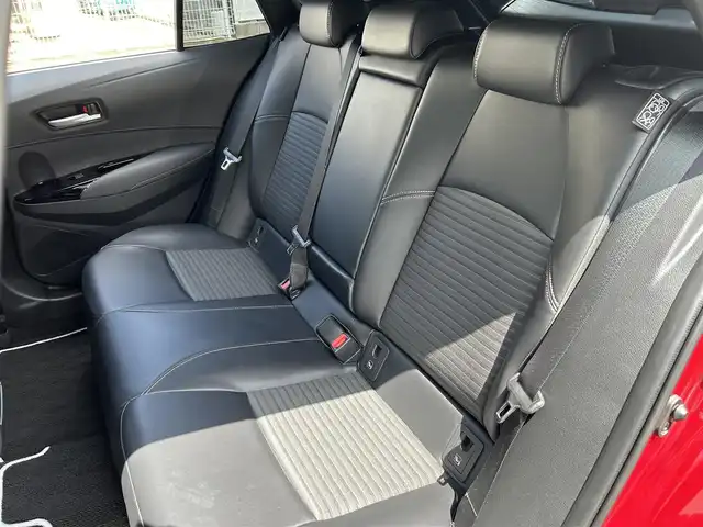 トヨタ カローラツーリング ダブルバイビー 福岡県 2022(令4)年 1.4万km センシュアルレッドマイカ ワンオーナー/禁煙車/純正ナビ（AM/FM/BT）/レーダークルーズコントロール/前席シートヒーター/ステアリングヒーター/バックカメラ/クリアランスソナー/ビルトインETC/LEDライト/オートハイビーム/フォグライト/ウインカーミラー/プッシュスタート/スマートキー/スペア×１/横滑り防止装置/レーンキープアシスト/純正フロアマット/純正１７インチアルミホイール/保証書/取扱説明書