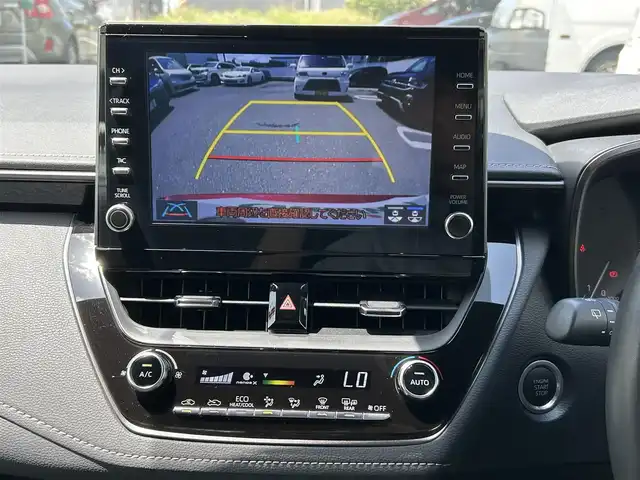 トヨタ カローラツーリング ダブルバイビー 福岡県 2022(令4)年 1.4万km センシュアルレッドマイカ ワンオーナー/禁煙車/純正ナビ（AM/FM/BT）/レーダークルーズコントロール/前席シートヒーター/ステアリングヒーター/バックカメラ/クリアランスソナー/ビルトインETC/LEDライト/オートハイビーム/フォグライト/ウインカーミラー/プッシュスタート/スマートキー/スペア×１/横滑り防止装置/レーンキープアシスト/純正フロアマット/純正１７インチアルミホイール/保証書/取扱説明書