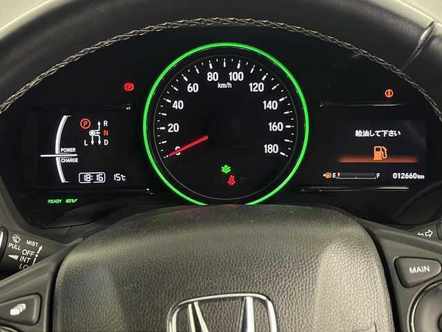 ホンダ ヴェゼル ハイブリッド RS ホンダセンシング 埼玉県 2016(平28)年 1.3万km プレミアムクリスタルレッドM 純正SDナビ(型式：VXM-164VFi)/CD/DVD/Bluetooth/フルセグ/バックカメラ/前後ドライブレコーダー/追従機能付きクルーズコントロール/レーンキープアシスト/ビルトインETC/ハーフレザーシート/前席シートヒーター/純正18インチアルミホイール/純正フロアマット/プッシュスタート/スマートキー
