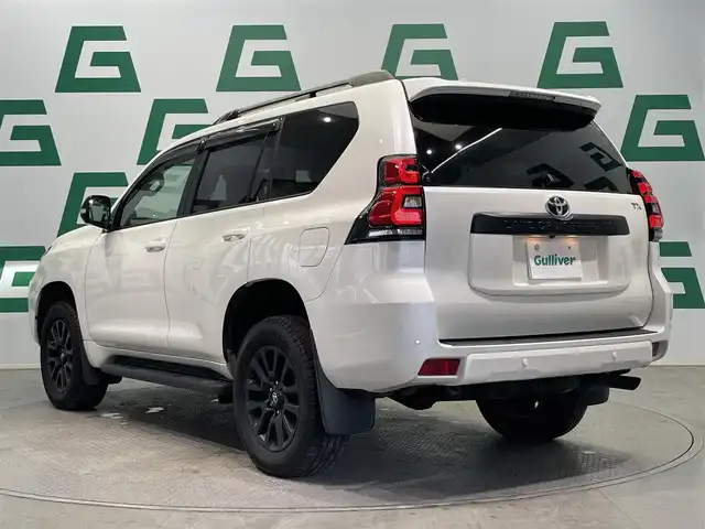 トヨタ ランドクルーザー プラド TX Lパッケージ マットブラED 鹿児島県 2023(令5)年 2.2万km ホワイトパールクリスタルシャイン 禁煙車/４WD/トヨタセーフティセンス/　・プリクラッシュセーフティ/　・レーンディバーチャーアラート/　・オートマチックハイビーム/　・レーダークルーズコントロール/サンルーフ/シートベンチレーション/前後コーナーセンサー/電動格納サードシート/ナビ機能付きディスプレイオーディオ/　・Bluetooth/　・USB/　・AppleCarPlay/　・AndroidAuto/ETC2.0/ドライブレコーダー/純正フロアマット/純正ドアバイザー/全席オートパワーウィンドウ/ステアリングリモコン/電動格納ミラー