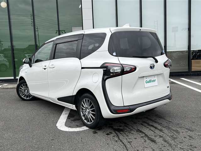 トヨタ シエンタ ハイブリッド G クエロ 岐阜県 2019(平31)年 1.2万km ホワイトパールクリスタルシャイン 登録時走行距離11688km/純正7インチナビ/バックモニター/フルセグテレビ/両側パワースライドドア/トヨタセーフティセンス/社外アルミホイール/純正フロアマット/LEDヘッドライト/ハーフレザーシート/オレンジステッチ/ビルトインETC/スマートキー/プッシュスタート/禁煙車/Bluetooth接続/レーンキープアシスト