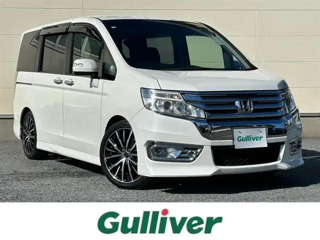 ホンダ ステップワゴン スパーダ Z インターナビセレ 茨城県 2012(平24)年 7.3万km ホワイトオーキッドパール 純正ナビ/(FM/AM/CD/DVD/フルセグ)/フリップダウンモニター/バックカメラ/ドライブレコーダー(前方)/ETC/クルーズコントロール/両側パワースライドドア/社外アルミホイール(PASSAGE)/パドルシフト/パワーステアリング/横滑り防止装置/オートライト/スペアキー