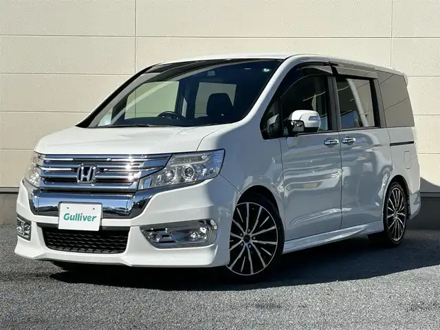 ホンダ ステップワゴン スパーダ Z インターナビセレ 茨城県 2012(平24)年 7.3万km ホワイトオーキッドパール 純正ナビ/(FM/AM/CD/DVD/フルセグ)/フリップダウンモニター/バックカメラ/ドライブレコーダー(前方)/ETC/クルーズコントロール/両側パワースライドドア/社外アルミホイール(PASSAGE)/パドルシフト/パワーステアリング/横滑り防止装置/オートライト/スペアキー