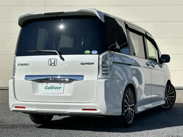 ホンダ ステップワゴン スパーダ Z インターナビセレ 茨城県 2012(平24)年 7.3万km ホワイトオーキッドパール 純正ナビ/(FM/AM/CD/DVD/フルセグ)/フリップダウンモニター/バックカメラ/ドライブレコーダー(前方)/ETC/クルーズコントロール/両側パワースライドドア/社外アルミホイール(PASSAGE)/パドルシフト/パワーステアリング/横滑り防止装置/オートライト/スペアキー