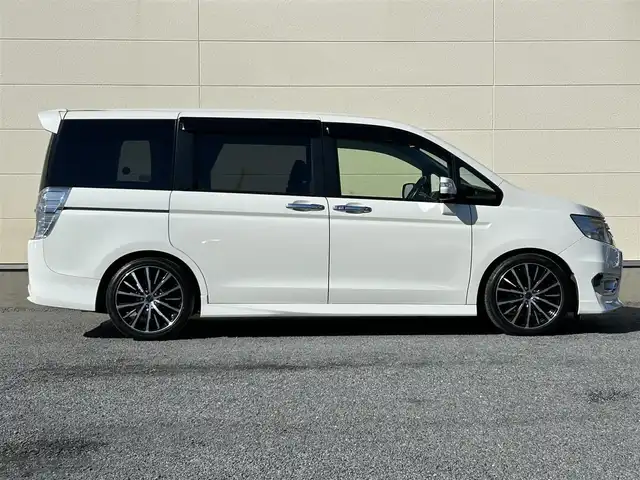 ホンダ ステップワゴン スパーダ Z インターナビセレ 茨城県 2012(平24)年 7.3万km ホワイトオーキッドパール 純正ナビ/(FM/AM/CD/DVD/フルセグ)/フリップダウンモニター/バックカメラ/ドライブレコーダー(前方)/ETC/クルーズコントロール/両側パワースライドドア/社外アルミホイール(PASSAGE)/パドルシフト/パワーステアリング/横滑り防止装置/オートライト/スペアキー