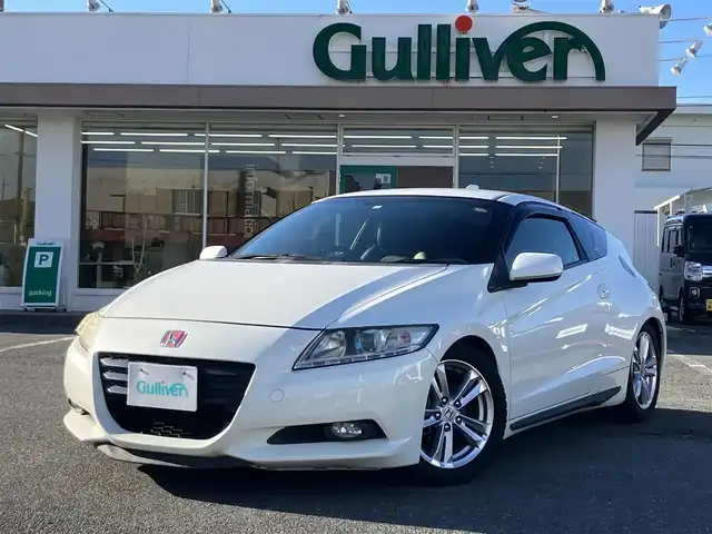 ホンダ ＣＲ－Ｚ α 三重県 2012(平24)年 8.4万km プレミアムホワイトパール ♪純正HDDナビ/・DVD再生 CD録音/・TV・USB/♪バックカメラ/♪クルーズコントロール/♪コーナーソナー/♪レザー調シートカバー/♪TEIN車高調（ローダウン）/♪ZERO1000エアクリーナー/♪社外マフラー/♪純正16インチアルミ/♪HIDヘッドライト/♪フォグライト/♪オートライト/♪アイドリングストップ/♪革巻ステアリング/♪パドルシフト/♪ステアリングスイッチ/♪ビルトインETC/♪ウインカーミラー/♪電格ミラー/♪フロアマット/♪ドアバイザー/♪プライバシーガラス/♪横滑り防止装置