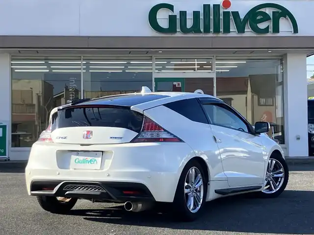 ホンダ ＣＲ－Ｚ α 三重県 2012(平24)年 8.4万km プレミアムホワイトパール ♪純正HDDナビ/・DVD再生 CD録音/・TV・USB/♪バックカメラ/♪クルーズコントロール/♪コーナーソナー/♪レザー調シートカバー/♪TEIN車高調（ローダウン）/♪ZERO1000エアクリーナー/♪社外マフラー/♪純正16インチアルミ/♪HIDヘッドライト/♪フォグライト/♪オートライト/♪アイドリングストップ/♪革巻ステアリング/♪パドルシフト/♪ステアリングスイッチ/♪ビルトインETC/♪ウインカーミラー/♪電格ミラー/♪フロアマット/♪ドアバイザー/♪プライバシーガラス/♪横滑り防止装置
