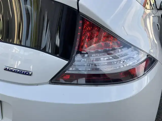 ホンダ ＣＲ－Ｚ α 三重県 2012(平24)年 8.4万km プレミアムホワイトパール ♪純正HDDナビ/・DVD再生 CD録音/・TV・USB/♪バックカメラ/♪クルーズコントロール/♪コーナーソナー/♪レザー調シートカバー/♪TEIN車高調（ローダウン）/♪ZERO1000エアクリーナー/♪社外マフラー/♪純正16インチアルミ/♪HIDヘッドライト/♪フォグライト/♪オートライト/♪アイドリングストップ/♪革巻ステアリング/♪パドルシフト/♪ステアリングスイッチ/♪ビルトインETC/♪ウインカーミラー/♪電格ミラー/♪フロアマット/♪ドアバイザー/♪プライバシーガラス/♪横滑り防止装置