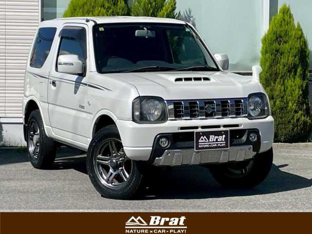 スズキ ジムニー クロスアドベンチャー 岩手県 2014(平26)年 7.7万km パールホワイト 社外メモリーナビ/（フルセグTV/CD/DVDBluetooth）/シートヒーター/ETC/パートタイム４WD/純正16インチナビ/フォグライト/ターボ/ドアバイザー