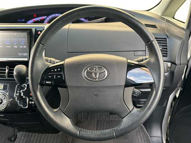 トヨタ エスティマ アエラス プレミアムエディション 埼玉県 2015(平27)年 12.6万km ホワイトパールクリスタルシャイン モデリスタエアロ/純正SD・T-Connect8インチナビ（NSZA-X64T）/　DTV/CD/DVD/BT/SD/SDREC/両側パワースライドドア/バックカメラ/ハーフレザーシート/純正フリップダウンモニター（V11T-R62C）/2列目オットマン/ウォークスルー/クルーズコントロール/TRC（トラクションコントロール）/ビルトインETC/エンジンスタートボタン/スマートキー/純正HIDヘッドライト/フォグランプ/オートライト/純正アルミホイール