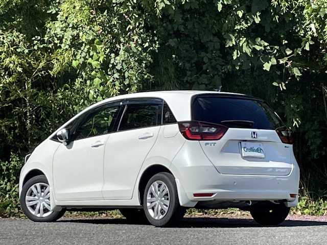 ホンダ フィット e:HEVホーム 大分県 2022(令4)年 2.7万km プラチナホワイトパール ホンダセンシング/アダプティブクルーズコントロール/レーンキープアシスト/純正メモリーナビ/バックカメラ/Bluetooth/DVD/ビルトインETC/純正LEDヘッドライト/オートライトコントロール/ハーフレザーシート/前後ドライブレコーダー/スマートキー/エンジンプッシュスタート