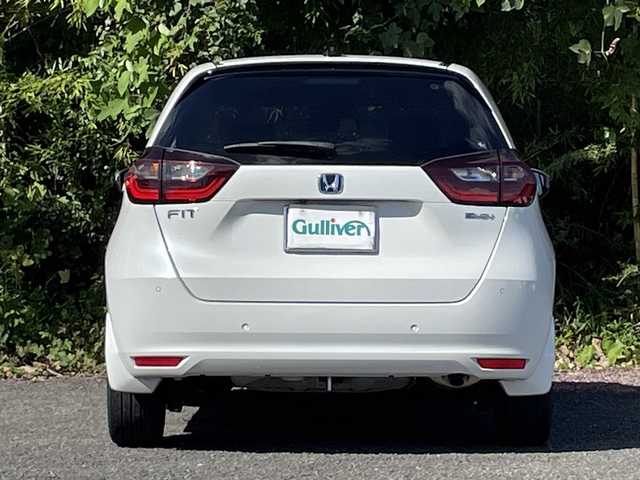 ホンダ フィット e:HEVホーム 大分県 2022(令4)年 2.7万km プラチナホワイトパール ホンダセンシング/アダプティブクルーズコントロール/レーンキープアシスト/純正メモリーナビ/バックカメラ/Bluetooth/DVD/ビルトインETC/純正LEDヘッドライト/オートライトコントロール/ハーフレザーシート/前後ドライブレコーダー/スマートキー/エンジンプッシュスタート