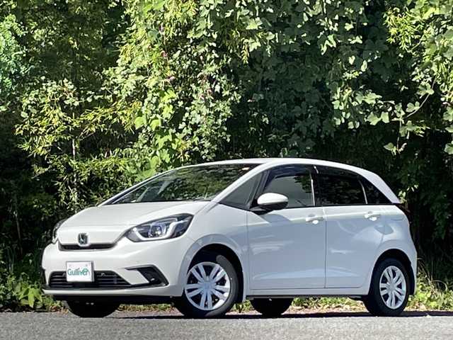 ホンダ フィット e:HEVホーム 大分県 2022(令4)年 2.7万km プラチナホワイトパール ホンダセンシング/アダプティブクルーズコントロール/レーンキープアシスト/純正メモリーナビ/バックカメラ/Bluetooth/DVD/ビルトインETC/純正LEDヘッドライト/オートライトコントロール/ハーフレザーシート/前後ドライブレコーダー/スマートキー/エンジンプッシュスタート