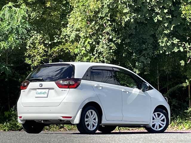 ホンダ フィット e:HEVホーム 大分県 2022(令4)年 2.7万km プラチナホワイトパール ホンダセンシング/アダプティブクルーズコントロール/レーンキープアシスト/純正メモリーナビ/バックカメラ/Bluetooth/DVD/ビルトインETC/純正LEDヘッドライト/オートライトコントロール/ハーフレザーシート/前後ドライブレコーダー/スマートキー/エンジンプッシュスタート