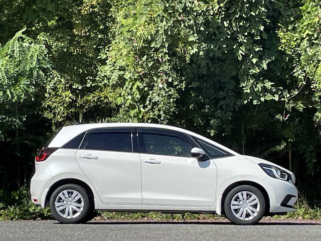 ホンダ フィット e:HEVホーム 大分県 2022(令4)年 2.7万km プラチナホワイトパール ホンダセンシング/アダプティブクルーズコントロール/レーンキープアシスト/純正メモリーナビ/バックカメラ/Bluetooth/DVD/ビルトインETC/純正LEDヘッドライト/オートライトコントロール/ハーフレザーシート/前後ドライブレコーダー/スマートキー/エンジンプッシュスタート