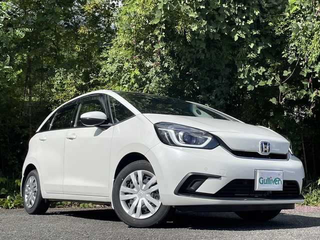 ホンダ フィット e:HEVホーム 大分県 2022(令4)年 2.7万km プラチナホワイトパール ホンダセンシング/アダプティブクルーズコントロール/レーンキープアシスト/純正メモリーナビ/バックカメラ/Bluetooth/DVD/ビルトインETC/純正LEDヘッドライト/オートライトコントロール/ハーフレザーシート/前後ドライブレコーダー/スマートキー/エンジンプッシュスタート