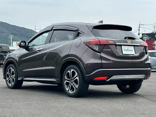 ホンダ ヴェゼル ハイブリッド Z ホンダセンシング 鹿児島県 2019(令1)年 5.8万km オーロラアメジストメタリック ワンオーナー/ホンダセンシング/ギャザーズナビ/フルセグ/バックカメラ/ハーフレザーシート/シートヒーター/純正17インチアルミ/LEDヘッドライト/ETC/ドラレコ
