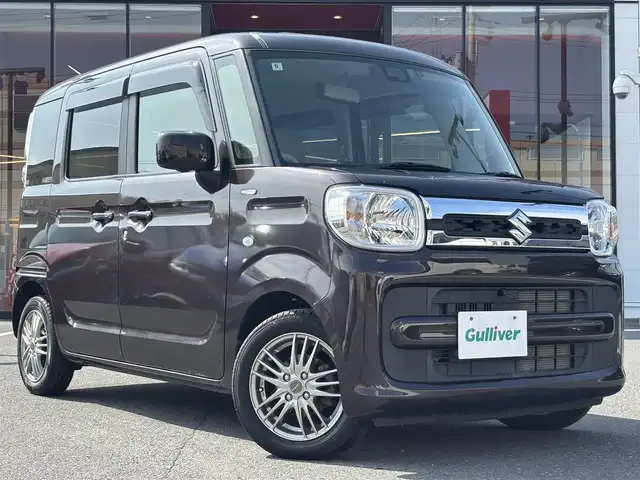 スズキ スペーシア HYBRID X 宮城県 2020(令2)年 1.6万km アーバンブラウンパールメタリック 登録時走行距離15344km/純正ナビ/FM・AM・TV・Bluetooth・CD・DVD・USB/プッシュスタート/スマートキー/バックカメラ/シートヒーター/両側パワースライドドア/コーナーセンサー/電動格納ミラー/純正フロアマット/ドアバイザー/スタッドレスタイヤ（4本）/ヘッドライトイベライザー/フルフラットシート/ベンチシート