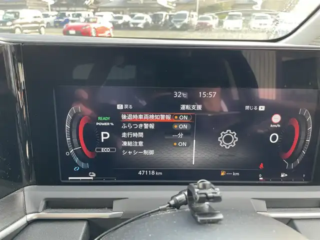 日産 オーラ G レザーエディション 熊本県 2022(令4)年 4.8万km ミッドナイトブラック/サンライズカッパー 社外ナビ/・AM/FM/BT/・フルセグTV/全周囲カメラ/エマージェンシーブレーキ/レーンキープアシスト/後側方支援/標識認識機能/ふらつき警報/オートマチックハイビーム/デジタルインナーミラー/オートライト/LEDヘッドライト/ステアリングヒーター/革シート/・前席シートヒーター/革巻きステアリング/・ステアリングスイッチ/電動パーキングブレーキ/オートホールドブレーキ/電動格納ミラー/ウインカーミラー/純正フロアマット