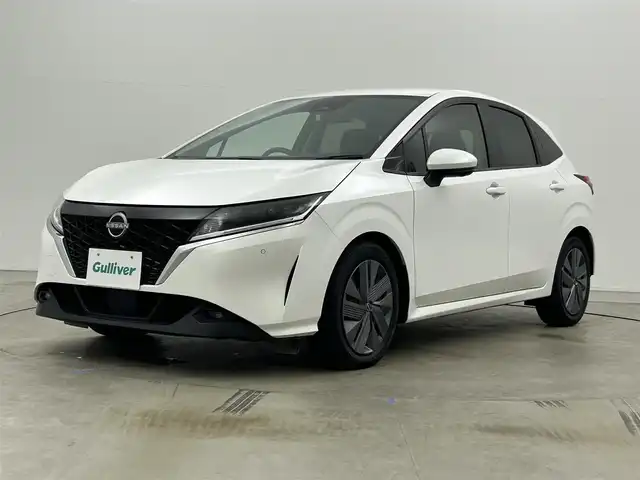 日産 ノート X 岡山県 2023(令5)年 5万km ピュアホワイトパール 純正９インチナビ　(MJ121D-L)/【CD/DVD/BT/USB/】/全方位カメラ　/ＬＥＤヘッドライト　/ＥＴＣ２．０　/デジタルインナーミラー　/ブラインドスポットモニター　/コーナーセンサー　前後/オートハイビーム　/オートエアコン/アイドリングストップ/禁煙車/オートブレーキホールド/踏み間違い防止