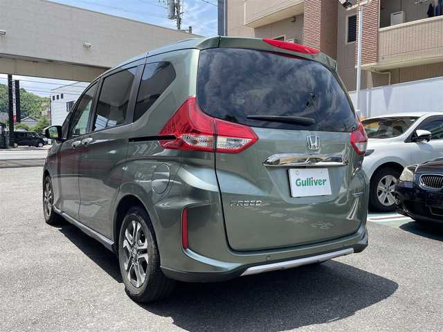 ホンダ フリード ハイブリット クロスター ホンダセンシング 静岡県 2022(令4)年 3.4万km シルバーミストグリーンM 純正ナビ/CD/SD/BT/バックカメラ/両側パワースライドドア/ハーフレザーシート/衝突軽減ブレーキ/レーンキープアシスト/レーダークルーズコントロール/クリアランスソナー/前後ドライブレコーダー/ビルトインETC/ステアリングスイッチ/LEDヘッドライト/LEDフォグライト/純正15インチAW/保証書/取扱説明書/ナビ取扱説明書/R5/R7点検記録簿有