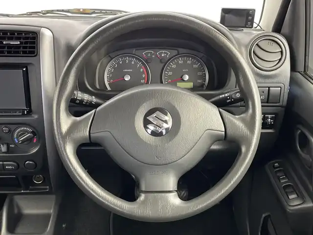スズキ ジムニー XC 新潟県 2014(平26)年 7.3万km シルキーシルバーメタリック 社外ナビ（CN-RA03D)/フルセグTV/DVD再生機能/Bluetooth/ドライブレコーダー/ETC/リモコンキー/純正フロアマット/ルーフレール/背面タイヤ/レーダー探知機