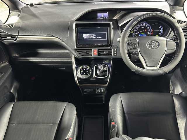 トヨタ エスクァイア ハイブリッド Gi ブラックテーラード 沖縄県 2016(平28)年 6.2万km スパークリングブラックパールクリスタルシャイン 県外仕入れ/純正9インチナビ/(フルセグTV/CD/DVD/BT)/バックカメラ/社外フリップダウンモニター/両側パワースライドドア/トヨタセーフティセンス/クルーズコントロール/レーンディパーチャーアラート/オートマチックハイビーム/前後ドラレコ/ETC2.0/ステアリングスイッチ/リアオートエアコン/シートヒーター