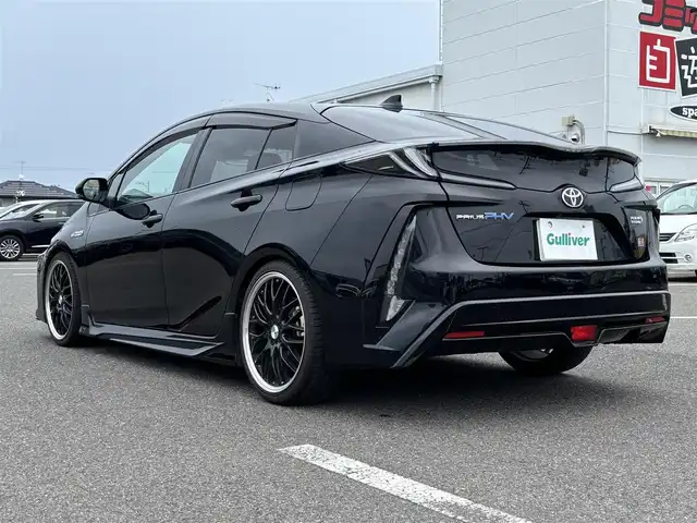 トヨタ プリウス ＰＨＶ S GRスポーツ 大分県 2019(平31)年 11.7万km アティチュードブラックマイカ ・純正ナビ(BT.USB.AUX)/・フルセグテレビ/・バックカメラ/・プリクラッシュセーフティ/・AC100V/・レーダークルーズコントロール/・ETC 2.0/・ドライブレコーダー/・テレビキャンセラー/・前席シートヒーター/・ハーフレザーシート/・オートハイビーム/・オートライト/・ステアリングリモコン/・スマートキー/・プッシュスタート/・GRフロアマット
