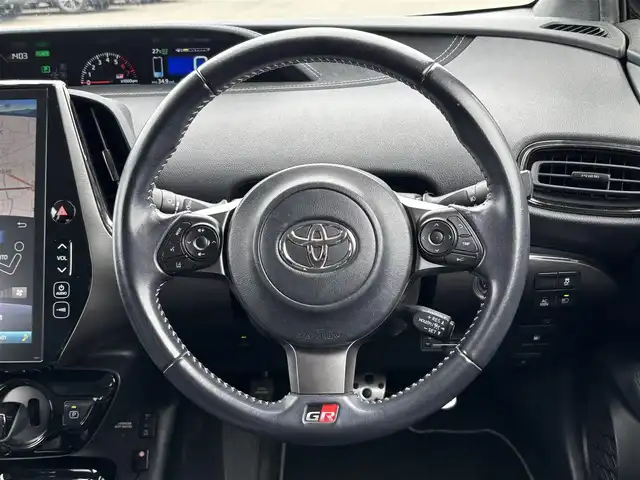 トヨタ プリウス ＰＨＶ S GRスポーツ 大分県 2019(平31)年 11.7万km アティチュードブラックマイカ ・純正ナビ(BT.USB.AUX)/・フルセグテレビ/・バックカメラ/・プリクラッシュセーフティ/・AC100V/・レーダークルーズコントロール/・ETC 2.0/・ドライブレコーダー/・テレビキャンセラー/・前席シートヒーター/・ハーフレザーシート/・オートハイビーム/・オートライト/・ステアリングリモコン/・スマートキー/・プッシュスタート/・GRフロアマット