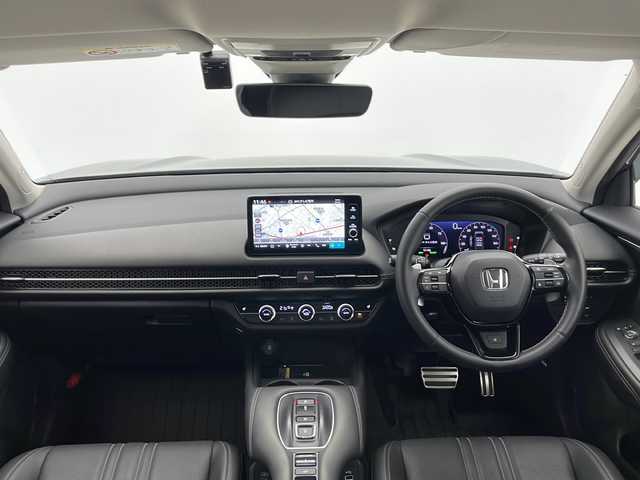ホンダ ＺＲ－Ｖ ハイブリッド e:HEV Z 長野県 2023(令5)年 1.4万km スーパープラチナグレーメタリック 4WD/ホンダセンシング/純正メモリナビ/Bluetooth/フルセグTV/全方位カメラ/ETC2.0/ステアリングヒーター/パワーシート（運転席、助手席）/シートメモリ/シートヒーター（運転席、助手席）/BOSEサウンド/置くだけ充電/衝突被害軽減システム/踏み間違い衝突被害軽減/レーンキープアシスト/横滑り防止装置/路外逸脱抑制機能/フロントロアスカート/サイドロアスカート/テールゲートスポイラー/ステアリングスイッチ/パドルシフト/純正18インチAW装着/社外フロアマット/ドアバイザー/LEDヘッドライト/前後コーナーセンサー/スマートキー